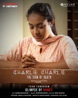 Shruthi Narayanan Instagram - CHARLIE CHARLIE - THE SIGN OF DEATH - GLIMPSE OF NANCY - POSTER
.
.
Director : @rashid_2708 
Dop : @gangadharanrajagopal
Editor: @srk_daniel_ 
Music : @surendardass4
Executive producer: @_lokesh_subramani 
Producer : @nylahsweettreat
My Dop team
@karthik_lessoner 
@19983010am 
@mr.black.physco 
Sanjay 
Special thanks
@samji_filmmaker
@asjeshwanth .
Cast 
@_rj_sriram_ 
@_manjubashine_ 
@iamshruthinarayanan
@i_tisthatis 
@srivijay_chandrasekar