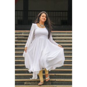 Shruthi Narayanan Instagram - The 1st time I saw this dress in the song "Meesa Beauty" from "REMO", i knew I had to have the white chudi that Keerty Suresh wore in the small interlude sequence.

When I asked mom to stitch it I never knew it would turn out to be this beautiful and while pairing it with the beautiful small chocker and earing I really feel like I'm an Angel.

You can also get this dress customised from @charuclothingstore . Do check it out.

📍
Remo | Model | modelphotography | Meesabeauty | Customized outfits | No makeup makeup look.

#remo #meesabeauty #keerthysuresh #shruthinarayanan #actress #model #instagood #instainfluencer #influencer #explorepage #fyp #flauntingtheflaws🌈 #vidhya #siragadikaasai