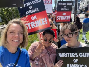 Siân Heder Instagram - We’re on strike. Writers are the driving force behind film and television. We are responsible for creating, writing and producing more than 4,000 episodes of scripted programming and hundreds of films each year. We are asking for less than 2% of the Hollywood profits these massive corporations make off our work. And yes that means I’m picketing in a boot with a broken foot. #wgastrong