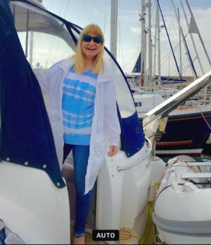 Siân Lloyd Instagram - Thrilled that travel journo @simon_calder recommends the Ards Peninsula for a holiday on @bbcradio4 Hear hear! I love Northern Ireland. Pictured all ready to glide out of Bangor Marina 🛥️ Hwyl wrth godi hwyl!  #ards #peninsula #county #down #northernireland #boat #marina #sea #bangor #sunglasses #tiedye