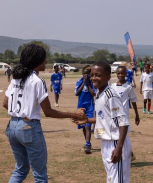Sibongile Mlambo Instagram - Who's NOT hyped about the World Cup right now?! Soccer is the sport that single-handedly brings the world together - literally. 

While visiting Nakivale Refugee Settlement in Uganda with @rotaryinternational, I was assigned a team and we won! I experienced how a simple soccer ball can bridge together peace and much needed support between distinct communities. 

#playon #peace #soccerforall #worldcup #rotaract #rotary #rotaryinternational #advocate #africa #humanitarian #aid #flashbackfriday #uganda