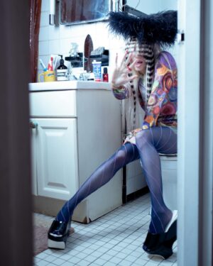 Sideara St. Claire Instagram - U wake up in the middle of the night for ur 3 AM pee and this is what u see WDYD????
 
Obsessed w everything going on here - wearing my fav @shopsideara feather hat with incred @pelitozlocos spiral bang hairpiece, dripping in @desertstarsvintage (this Todd oldham cardigan pleaseeee) shot by lovely lovely @alyssa_tiffany and styling with angel @josienolann what a fun day !!!

I’m finishing up my new collection for @worldofmyownnyc’s show on the 26th and I’m very excited!!!