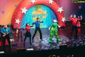 Simon Pryce Instagram - Our North American concert tour kicked off today in New Jersey, and it was the most magical, fun time! 🎉 

Thanks to everyone who came along to sing and dance with us. It was so wonderful to see many of our American friends 💛💜❤️💙

Next stop, Long Island! 

Tickets still available for shows across the US   Canada, head to the link in our bio for all the info 🎫 

📸 @nicoledibphotography
🏠 @thewellmonttheater 

#thewiggles #readysteadywiggle #kids #livemusic #ontour #newyork #usa #canada