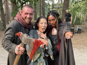 Sophia Brown Instagram - 🤠🎞️📍💫🌱
⁣⁣
1. The Journey to Xin’trea.🌪️🥁

2. Me learning to play the Black Rose on the Nyckelharpa! 🎻 - Thank you so much @nyckelvix 

3. Three way fight from end of Ep1 - With our glorious stunt doubles. 🙅🏾‍♀️🙅🏻‍♀️🙅🏻‍♂️

4. Post Bank Fight 🩸💰

5. Me and Laurence playing around in Zacares Marsh of the Mists 😶‍🌫️