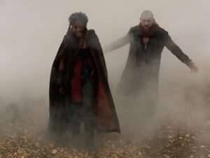 Sophia Brown Instagram - 🤠🎞️📍💫🌱
⁣⁣
1. The Journey to Xin’trea.🌪️🥁

2. Me learning to play the Black Rose on the Nyckelharpa! 🎻 - Thank you so much @nyckelvix 

3. Three way fight from end of Ep1 - With our glorious stunt doubles. 🙅🏾‍♀️🙅🏻‍♀️🙅🏻‍♂️

4. Post Bank Fight 🩸💰

5. Me and Laurence playing around in Zacares Marsh of the Mists 😶‍🌫️