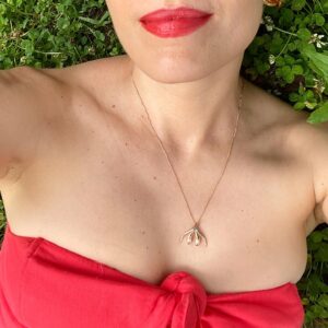 Sophia Wallace Instagram - I am overjoyed to announce my first collection of “Unconquerable” necklaces in solid 14k gold. The collection includes rose, yellow & white gold, with and without gemstones. I’m wearing the gemstone prototype in rose gold with a deep aqua sapphire. I have been working on this collection for years. My dad’s encouragement to keep elevating the quality and aesthetic of my jewelry has been a constant source of encouragement, pushing me forward. Also invaluable is the steadfast support of my collectors, small and large, and my wonderful clients. Thanks to all of you for making this great leap possible. For more information, pictures and to reserve a necklace, visit:  https://yescliteracy.com/