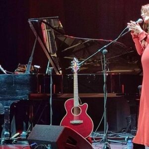 Sophie Auster Instagram - Guess the cat is out of the bag now…Here I am tonight 7 months pregnant previewing new material from my upcoming album, Milk For Ulcers, with the effervescent @maloumadi on piano. Thank you to everyone who came out tonight for our first performance of this small run in Spain. Thank you @culturamva for having me. Performing with baby will be something I’ll never forget.