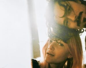 Sophie Kennedy Clark Instagram - I miss my pink hair. And this fella in the corner. In no particular order. #pentax #film #tbt @longlukearnold