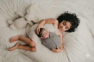 Srinish Aravind Instagram - Safe is her Chechi’s arms ❤️✨🧿
Nila & Nitara
.
.
Click @todstories 
Nila wearing @_susan_lawrence_
