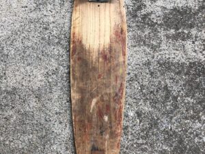 Stacy Peralta Instagram - This skateboard is my most precious possession.  Why?  Because it’s the board I transitioned from clay to this rumored new wheel made of a space-age material called Urethane.  They said urethane wheels could handle hard turns, run over pebbles and cracks and ride smoothly over rough pavement.  The promise sounded impossible and on top of that they were going to sell for the preposterous price of $2.00 a set!  That’s 50 cents a wheel.  Why would I pay 50 cents for one wheel when I could buy 16 clays for 50 cents at the bargain bin of a thrift store?  What a scam.  One of my skate buddies was Kevin Farlee, who aside from having the messiest bedroom I’d ever seen, Kevin was writing computer programs in high school and so he was far smarter than me.  He showed up at my house one day with a set of urethane wheels mounted on his homemade board.  This was my first sight of them.  He said they were called Cadillac Wheels; they were translucent, soft to the touch and so unlike anything I’d ever seen.  He said they rode beautifully but I was skeptical so he handed me his board and said: “see for yourself.” I dropped his board on my driveway, took two fast pushes and turned hard onto the sidewalk expecting the wheels to slide out.  They didn’t. I then did a number of rapid fire pumping turns up the sidewalk and then ripped a Bertleman turn on the corner and the wheels held.  Okay, how about this…I purposely ran over some vengeful cracks, cracks I religiously avoided on clay and I breezed over them.  WOW!  How was this possible?  For years I’d been riding wheels that were the equivalent to what the ancient Romans used on their chariots and now I’m riding wheels with the smoothness of rubber.  It was revolutionary!  Kevin was not only a good friend but a gentle person and a generous one too.  Everyday for the next three weeks he came to my house, sat on my lawn and let me rip around on his board.  Urethane wheels were everything they promised and they were about to unlock everything we could ever dream of including the flight paths of our lives because my life’s journey began the day Kevin brought those wheels to my house.  Thanks Kev, I still owe you…DM me to catch up!