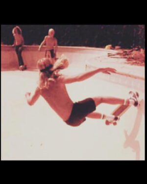 Stacy Peralta Instagram - Another very rare board from my collection and the story behind it: Right after the collapse of the Zephyr team and months before getting sponsored by Gordon&Smith I was sponsor-less, as were many Z Boys at that time.  Bob Biniak had just hooked up with Sims and said to me one day; “You need to get off your Zephyr board, you need a board with a kick-tail for the pools we’re riding.  He then handed me a flat wooden Sims board and said; “Go home to your kitchen, boil a pot of water like you’re gonna make spaghetti, drop the tail in the pot and boil it over night.  In the morning take the board into your garage, clamp it from the middle into a vice, tie a piece of rope around the tail, pull the rope as hard as you can until the tail bends and then tie the rope to a hook in the wall.  Let it sit for a week.  After that you’ll have a board with a kick-tail.  I did exactly as Bob said; I dropped the board into a pot and boiled it overnight.  Next I clamped it into a vice, pulled back the tail and tied it to a wall.  A week later, I untied it, opened the vice and there it was, a board with, if not an actual angled kick-tail, a tail with a really strong and effective warp.  I mounted it with Bennett Trucks and Sims Pure Juice Wheels. Later that day we got word of a new pool way out at the far end of the San Fernando Valley in an area of old farm houses and orange groves.  We were told a 90 year old woman lived on the property but she was hard of hearing so sneaking in wasn’t a problem. Biniak, Alva and I drove out in my VW Squareback, found the place, hopped the fence and encountered what I still consider today to be the best backyard pool I’ve ever ridden.  We called it the Devonshire Pool because it was the Devonshire exit off the 405 freeway.  That Sims board rode incredibly well and was a huge step up from my Zephyr and the tail worked just as Biniak had said.  Shortly thereafter Gordon&Smith came to me with a great offer.  At my contract signing Larry Gordon asked me what I’d like to call my new skateboard model, to which I replied; “Why don’t we call it the Warptail?”
