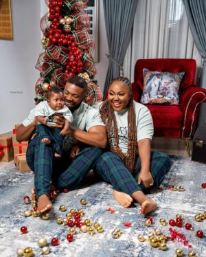 Stan Nze Instagram - May the joy of this season never depart from your household. Merry Christmas 🎄

with ❤️ from The Nzes 

PJs by @kwuchiz_stitches 
Tree by @surprisecore 
Photographed by @thomfelix_concept 

#MerryChristmas #TheNzes #Jaybobo #Ngozichierika