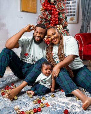 Stan Nze Instagram - May the joy of this season never depart from your household. Merry Christmas 🎄

with ❤️ from The Nzes 

PJs by @kwuchiz_stitches 
Tree by @surprisecore 
Photographed by @thomfelix_concept 

#MerryChristmas #TheNzes #Jaybobo #Ngozichierika