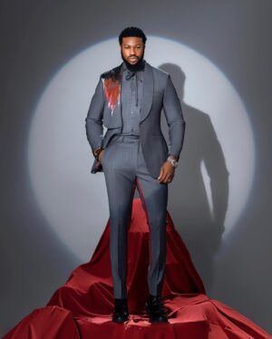 Stan Nze Instagram - Tall Glass of 🍷

As designed by @p.ariesofficial 
Photographed by @thomfelix_concept 

#TheScarletSuit #MaziNze #NewWine #Fashion #FashionableBlackMen
