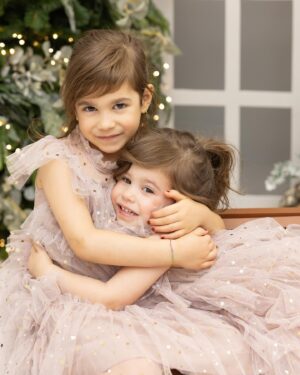 Stella Acquisto Instagram - Merry Christmas from my family to yours. 

I’m counting every little blessing this year. I know the holidays aren’t merry for everyone, so if you’re having a hard time this year, I’m sending you an extra hug and love your way. 

Thanks to @alannabphotography for the wonderful photos.  The last picture is a throwback. 
#merrychristmas #happyholidays #love #family