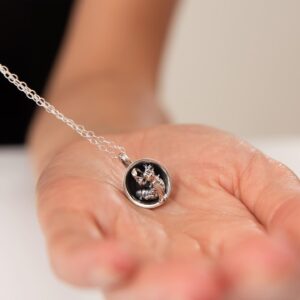 Stephanie Tripp Instagram - Checkout the Labyrinth Collection from @licensedtocharm. Created to mark the 35th Anniversary of this timeless classic @hensoncompany 🎬
....
Here I am wearing a Labyrinth book necklace & door knocker character earrings. And the second picture is a cute worm necklace. “Come inside and meet the missus” 🐛
....
#thepridepiper labyrinth #silverjewellery #silver #film #fantasy #fantasyart #art #jewellery #silverjewelry #earrings #necklace #book #hensoncompany #anniversary #classic #cultclassic