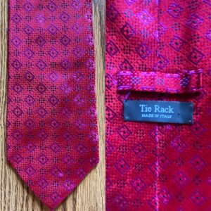 Stephen Fry Instagram - A Tie Rack edition today. Older viewers will remember how every High Street and railway station used to boast a Tie Rack store. Some were little more than booths or kiosks. Along with Sock Shop the chain exemplified a corner-turning moment in 80s and early 90s retail style and habits.

Pic 1 (swipe left) shows a standard Tie Rack tie, with a standard Tie Rack label. Fine in its way – has a pleasing mauve sheen when you turn it in the light.

Pic 2 displays a “Primavera For Tie Rack”. Was Primavera (the Italian for “spring”) an in-house design studio, I wonder? Did the extra name on the label indicate a “designer tie” with a corresponding hike in price? The word “designer” was beginning to be prepended to everything from sunglasses to boxer shorts back then.

Pic 3 shows two “Charleston Tie Rack” specimens.

Swipe left again for a “Chevalier” tie which looks to be greatly influenced by Versace (yes, doesn’t it need a damned good steam?) Pic 5 is “Angelo Bosani”. I wonder if Signor Bosani designed exclusively for Tie Rack? Certainly if you search for his work on eBay and elsewhere they all seems to be Tie Rack items.

Can we discern a distinct difference according to label? Every one of them is 100% silk and all declare themselves to be made in Italy (except the Chevalier which doesn’t reveal its origin). I would say the two Charlestons and the Primavera have a certain something in common, an almost watercolour effect perhaps, whereas the Pic 1 Tie Rack, the Chevalier and the Angelo Bosani are all individual unto themselves.

It’s of no great matter, doubtless some marketing figure decided that there should be this variation in labelling. Tie Rack has gone to retail heaven where it is kitting out the angels in good, but not great, fine but not fabulous, quality but not costly, neck wear. I wish them a blissful eternity, or as Horatio almost phrased it to the dying Hamlet, “Good night, sweet Tie Rack, and flights of angels sing thee to thy rest.”