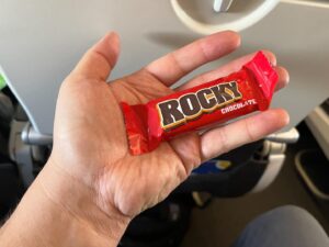 Steve Cardenas Instagram - My flight attendant really takes care of me.  She even brings me red chocolate bars with my name on them… #EatMe