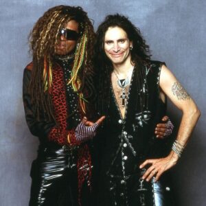 Steve Vai Instagram - TM Stevens was a force of nature on bass. He was a colorful, intense, and completely accomplished player. His sound was amazingly fat and loud! I was fortunate enough to have had him play on my “Sex and Religion” recordings and the “Down Deep Into The Pain” video with Terry Bozzio and Devin Townsend. We made some powerful music and had great laughs. He was completely committed to his craft and was a professional from head to foot and was loved by the myriad celebrity artists he’s played with. He had been suffering with dementia for quite some years now and made his transition this week. My condolences to his family, friends and fans. Through the years, I loved thinking about TM and the great time we spent together as bandmates and friends.  When I visualize him now in my minds eye, I see that gigantic warm smile, that rich deep laughter voice and I feel the walls shaking in remembrance of his overall power when he played. Peace Brother.