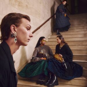 Stuart Vevers Instagram - #CoachWinter24
 
A note from Creative Director, Stuart Vevers: 
 
This collection is defined by today’s generation, who have taken the elements of classical American style and rewritten them to suit their needs. 
 
I was inspired in part by films like “Metropolitan” and the television show “Twin Peaks.” Both feature these bands of young people, often dressed in clothes that reference an earlier era, but always inflected with a sense of the now. 
 
There is a feeling of playing dress-up in granny’s closet here, in the repurposed skirts and the sparkling charms. But it’s contrasted with dressed-down, unconventional elements like plaid pajamas, boxer shorts and shearling slippers. I find there’s something both bold and vulnerable about today’s generation picking up these very classical pieces and finding their own way to wear them. 
 
We’re designing for real people, who move through the real world. One moment they might be bundled up against the cold, and the next they’re in the hot-house environment of a party, and they’re ready for all of it. 
 
It’s a spontaneous, care-free way of dressing, defined by love-worn, lived-in pieces that acknowledge the past while looking toward the future. 
 
And it’s a new kind of luxury - imperfect and all its own.  #CoachNY
 
© KFS ™ Hearst
 
 
Stylist: #OlivierRizzo
Photographer: @vinceaung