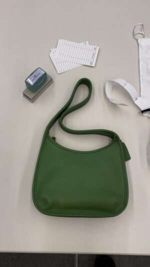 Stuart Vevers Instagram - 👜💚🫒✂️💚 ergo archive tour, thank you @laura.g.co #didyouknow the @coach Ergo Bag was first released in 1997? 

#coachoriginals