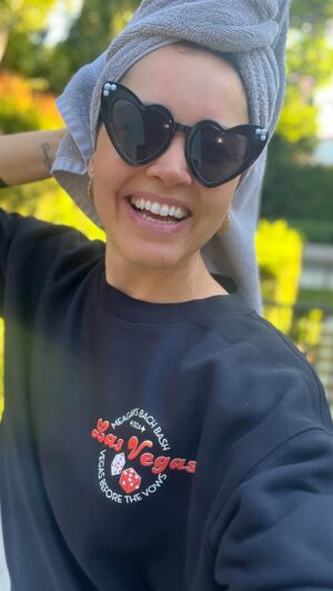 Susie Castillo Instagram - Back in LA and rocking my cute & cozy bachelorette weekend merch from @donedealmerch! Designed by the one and only @sarathisgirl in honor of the bride-to-be @meagantandy! 🪩🎲😎