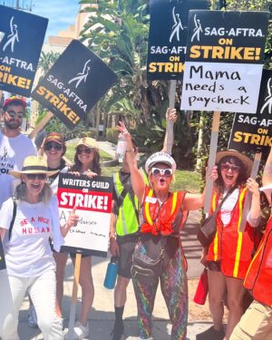 Susie Castillo Instagram - Couples who strike together, get paid together❤️✊🏼

Joined the picket line at Paramount Studios today in support of the #sagaftrastrike #wgastrike 

I’ve been a member of SAG AFTRA since 2004 and have seen the industry change significantly (for the worst) for most actors and writers and it’s about time our contracts reflect the HUGE change that streaming has brought to the industry during that time.

Streaming services don’t want to share their profits with the creatives that bring these shows to life. Shame on them for paying their CEOs multi-million dollar salaries per year (see what Paramount pays their CEO in my last slide) and not paying living wages to the majority of actors/writers and other folks who work behind the scenes on the shows and films we all love.

We’ll be out here for as long as it takes to work out a contract that’s fair and just. LFG!

#sagaftrastrong #sagaftramember 
#wgastrong