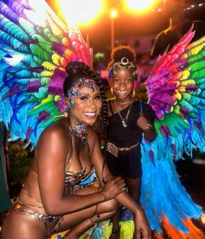 Sydelle Noel Instagram - The highlight of playing #PrettyMas Carnival was giving my backpack feathers to this pretty little girl. I saw her watching in awe of the costumes and I immediately knew I was giving it to her. She’s so cute with it on. 
If anyone knows her name or mom please DM me. Thank you!
Yay! *Update: Her name is Zendaya

#Grenada #GrenadaCarnival #GrenadaCarnival2023 #SpiceMas #PrettyMas