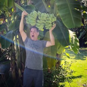 T.R. Knight Instagram - I bravely fought-off a spider the size of my face and then missed the last three rungs of the ladder, but it’s all worth it for BACKYARD BANANAS!