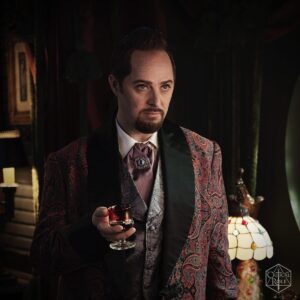 Taliesin Jaffe Instagram - The Lightkeeper is staying on the outskirts for now. Instead, I’ll be  introducing you to this charming gentleman and the most delightful dinner companions one could hope for. Do stay for cocktails with the Circle of the Crimson Mirror. @voiceofobrien @aimeecarrero @imarispeaks @alexanderward777 @critical_role #candella