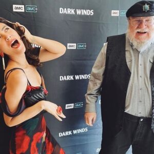 Tania Larsson Instagram - I had the honour to make jewellery pieces for @jessicamatten for her Dark Winds premiere in Santa Fe, here pictured with George R. R. Martin.

I created this ring using vintage beads, antique steel cut beads and 1ct of yellow diamond beads on moosehide. It is tufted with hand dyed caribou hair and backed with caribou hide. The band is sterling silver.

I made matching post earrings with long hand carved muskox drops.

My fiancée Razelle saved the day when she flew with these pieces to New Mexico to attend the premiere herself as she was a writer on the show and hand delivered them to Jessica.

❤️@razellebenally is so supportive. She saw me in tears earlier in the week because a whole box of jewellery I had made for Jessica Matten was lost by UPS and never made it on time for her special events which was heart breaking. I’m so thankful to Razelle for offering to hand deliver them. 🥰

Make sure to watch Jessica Matten in Dark Winds premiering tonight on AMC or stream it online!

#gwichinfinejewellery #cariboutufting #darkwinds #jessicamatten #georgerrmartin #indigenousactress #indigenousartist #nativeartist #nativejewelry