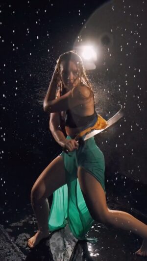 Tara Macken Instagram - Rain, swords and the babes @amyejohnston ⚔️ 
-
Happy birthday queen! Cheers to more years fighting through storms! Little BTS from an action shoot @foreverseen 📸
-
-
#photoshoot #bts #swords #martialarts #wushu #amyjohnston