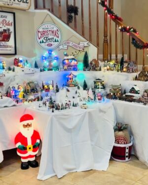 Tara Setmayer Instagram - As requested, here’s a closer look at our Winter Wonderland! Mom helps with the Christmas village (our best one yet!) and hubby helps with outside and everything above my head! And Tiki sleeps 😽.
I do everything else from the floral arrangements to the placements. We always get a real tree for the family room at least 11ft . We LOVE it! It takes about a week to get it all together. Merry Christmas everyone! 🎄🎄