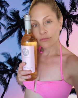 Tara Spencer-Nairn Instagram - HOT TIP - when drinking at the beach, if you match your swimsuit to your wine then when you inevitably spill it all over yourself NO STAINS! Also, less fruit flies at the beach. #rosé @bodega_gotica #roséallday #dorueda #tasterueda @dorueda #barbiesummer