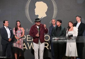 Tazbah Chavez Instagram - I first met @sterlinharjo and @taikawaititi about sixteen years ago when I was interning for @birdrunningh2o at Sundance — years after first meeting him when I was 16 on a film panel for my first short film. Through Bird, Sterlin and Taika instantly became my brothers/sisters and over the years they have been two people who called me what I was before long before I would call myself it: a writer, a poet, an artist, a filmmaker — then they invited me to make @rezdogsfx with them and it’s been the most rez boujiest time of my life alongside our fellow writers, producers, cast and crew. To be honored by @peabodyawards alongside them, presented by badass @kali_ko_reis , is pretty unreal — and a testament to their own perseverance and commitment to bringing others up with ‘em. And selfishly, anytime spent with @paulinaalexisofficial @lanefactor and @bobbydues is simply… blessings! 🪶 🐕 love love love [dress: @byellowtail . m/u: @paintedbypetra . shoes: @happy_brain lemme borrow them . jewels: 6th gen family heirlooms . hair: aveda taught me]