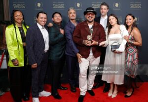 Tazbah Chavez Instagram - I first met @sterlinharjo and @taikawaititi about sixteen years ago when I was interning for @birdrunningh2o at Sundance — years after first meeting him when I was 16 on a film panel for my first short film. Through Bird, Sterlin and Taika instantly became my brothers/sisters and over the years they have been two people who called me what I was before long before I would call myself it: a writer, a poet, an artist, a filmmaker — then they invited me to make @rezdogsfx with them and it’s been the most rez boujiest time of my life alongside our fellow writers, producers, cast and crew. To be honored by @peabodyawards alongside them, presented by badass @kali_ko_reis , is pretty unreal — and a testament to their own perseverance and commitment to bringing others up with ‘em. And selfishly, anytime spent with @paulinaalexisofficial @lanefactor and @bobbydues is simply… blessings! 🪶 🐕 love love love [dress: @byellowtail . m/u: @paintedbypetra . shoes: @happy_brain lemme borrow them . jewels: 6th gen family heirlooms . hair: aveda taught me]