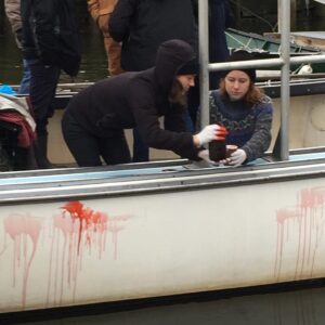 Tess Gerritsen Instagram - We're now filming "Island Zero," my horror feature film! Here the set decorators add "blood" to a lobster boat.