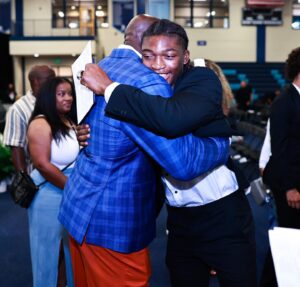 Thaddeus Bullard Instagram - Congratulations to my Youngest son @titusbullardd on his High school graduation from @berkeleypreparatoryschool today. You have made everyone so proud and we all know this is just the beginning of more great things to come. Now off to @uflorida and @gatorsfb to be Greater 🐊 Thank you to @allebloom7 aka Mother to my sons for being an amazing mother to our sons. Having my Daughter @leahbullard.official and Titus both Graduate High School on the same weekend plus traveling was definitely a Busy but Unforgettable weekend. Thank you to the entire village of Family, Friends, Teachers, Coaches, teammates and students that have made today possible. I’m grateful, Honored and Privileged to have 3 amazing children that have all follow their dreams and executed with excellence. Now I get to watch all three of my kids play D1 college athletics at the respective universities of of their choice❤️ @tjbullard_ @ucf.football @leahbullard.official @oaklandwbb and @titusbullardd @uflorida 🐊 #PROUDDAD #blessedfamily 

Thanks for the photos from one of the dopest in the game @realsupernola 🙌🏿❤️❤️