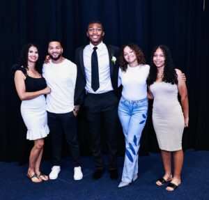 Thaddeus Bullard Instagram - Congratulations to my Youngest son @titusbullardd on his High school graduation from @berkeleypreparatoryschool today. You have made everyone so proud and we all know this is just the beginning of more great things to come. Now off to @uflorida and @gatorsfb to be Greater 🐊 Thank you to @allebloom7 aka Mother to my sons for being an amazing mother to our sons. Having my Daughter @leahbullard.official and Titus both Graduate High School on the same weekend plus traveling was definitely a Busy but Unforgettable weekend. Thank you to the entire village of Family, Friends, Teachers, Coaches, teammates and students that have made today possible. I’m grateful, Honored and Privileged to have 3 amazing children that have all follow their dreams and executed with excellence. Now I get to watch all three of my kids play D1 college athletics at the respective universities of of their choice❤️ @tjbullard_ @ucf.football @leahbullard.official @oaklandwbb and @titusbullardd @uflorida 🐊 #PROUDDAD #blessedfamily 

Thanks for the photos from one of the dopest in the game @realsupernola 🙌🏿❤️❤️