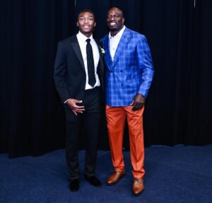 Thaddeus Bullard Instagram - Congratulations to my Youngest son @titusbullardd on his High school graduation from @berkeleypreparatoryschool today. You have made everyone so proud and we all know this is just the beginning of more great things to come. Now off to @uflorida and @gatorsfb to be Greater 🐊 Thank you to @allebloom7 aka Mother to my sons for being an amazing mother to our sons. Having my Daughter @leahbullard.official and Titus both Graduate High School on the same weekend plus traveling was definitely a Busy but Unforgettable weekend. Thank you to the entire village of Family, Friends, Teachers, Coaches, teammates and students that have made today possible. I’m grateful, Honored and Privileged to have 3 amazing children that have all follow their dreams and executed with excellence. Now I get to watch all three of my kids play D1 college athletics at the respective universities of of their choice❤️ @tjbullard_ @ucf.football @leahbullard.official @oaklandwbb and @titusbullardd @uflorida 🐊 #PROUDDAD #blessedfamily 

Thanks for the photos from one of the dopest in the game @realsupernola 🙌🏿❤️❤️