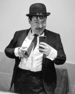 Thomas Ridgewell Instagram - No, I'm not Charlie fuckin' Chaplin. Being a large unit I really hate the idea of, even subconsciously, being assessed as merely a fat take on whatever I'm dressed as. So, whenever I receive an invite to a costume/themed party, I give myself the limitation of only dressing as historically fat characters or figures. 1920s themed party? That leaves me Al Capone or Oliver Hardy. Circus theme? Bearded lady. Royalty? Henry VII. Santa Claus. The Fat Controller. You get the idea. Why, even for a second, allow someone to relegate me to the status of an imposter? To internally accuse me of pretending to be something I'm far too fat to ever pass off convincingly? Of course, I know full well that everyone can and should wear whatever they want and in reality so few people would think the way I'm describing. However, a lifetime of gaining and losing weight, both in the public eye and in a family with a very self-loathing approach to fatness, has made my relationship with my own body one of obsessive awareness and scrutiny. I don't want my "struggles" with my weight to be a topic of discussion anymore - I've kept that to myself for over a year now - but how I inhabit this body is an entirely different conversation. Anyway, happy new year. Here's to overcoming insecurity and self-destructive habits in 2020!