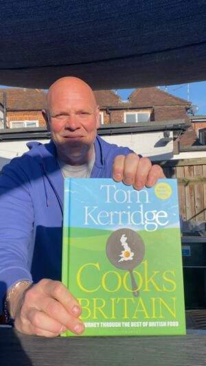 Tom Kerridge Instagram - Guess what’s in here? It’s always an exciting and nerve-wracking moment seeing my new book for the first time hot off the press. It’s full of recipes that celebrate the amazing ingredients Britain has to offer. The good news is, early copies will be on sale at @pubinthepark Marlow this weekend.  So come and find me in the M&S Food area at Pub in the Park, grab yourself an early signed copy. #pubinthepark #tomkerridge #cookbook