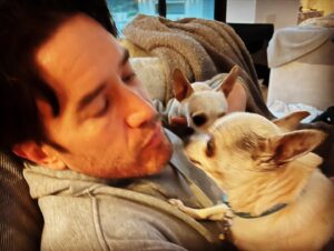 Tom Pelphrey Instagram - Heavy heart today.  We had to say goodbye to one of our pack.  DUMP TRUCK aka Dumpy was kind of a legend.  He ignored me for the first six months I knew him.  But slowly, he let me carry him.  Pet him.  Give him 2nd dinner.  Give him 3rd dinner.  He would stay up late with me and we would do midnight snack.  And by the end he was my guy- and he let me hold him and cuddle him and he always gave me kisses.  He really was a special dog.  What he lacked in size he more than made up for in personality.  And in a house FULL of personality- Dumpy was 👑. @kaleycuoco ♥️♥️♥️♥️♥️