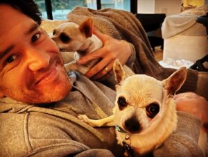 Tom Pelphrey Instagram - Heavy heart today.  We had to say goodbye to one of our pack.  DUMP TRUCK aka Dumpy was kind of a legend.  He ignored me for the first six months I knew him.  But slowly, he let me carry him.  Pet him.  Give him 2nd dinner.  Give him 3rd dinner.  He would stay up late with me and we would do midnight snack.  And by the end he was my guy- and he let me hold him and cuddle him and he always gave me kisses.  He really was a special dog.  What he lacked in size he more than made up for in personality.  And in a house FULL of personality- Dumpy was 👑. @kaleycuoco ♥️♥️♥️♥️♥️