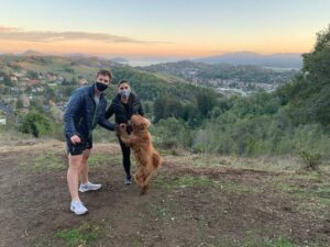 Tom Steyer Instagram - "Dancing at Sunset" (2020)
***
Took a hike yesterday in the hills of Marin during the late afternoon with my son Sam, daughter in law Tessa, and bernadoodle Jasper, among others.

Sun-dappled paths. Clean air. San Francisco shining in the distance. Very relaxing. Very invigorating.

My mental health, calm, and happiness improve so much with regular trips to the woods. The longer, the better. For two years, work has kept me from a long camping trip. 2021 will include at least one!