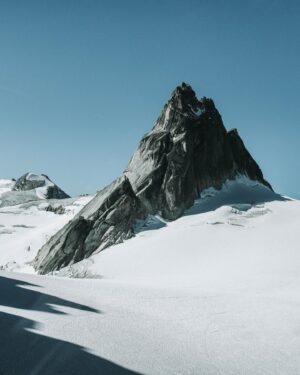 Tommy Caldwell Instagram - Our second big climbing spot of the trip was the Bugaboos. This is a place I have wanted to visit ever since my friend and alpine Climbing mentor @topher.donahue told me about climbing a wall in North America taller than El Cap. So after biking nearly a thousand miles from Mt. Hooker we hiked the 5 hours into the East Creek Basin. We climbed 4 big routes in 4 days ending in a big link up. All the routes we did were repeats of climbs put up by good friends including All Along The Watchtower, the climb Topher told me stories about. I’ll leave some mystery to the remaining details. As you might have guessed by now, this whole adventure is being filmed. So you’ll know soon enough. Let’s just say the Bugaboos is even more impressive than I had imagined. It was also great spending time with some all time favorite people in East Creek including @willstanhope, @sonnietrotter,  @maurybirdeell, and @ad_wyatt. 📸 @taylor._shaffer 

Just to the south of the Bugaboos is a valley called the Jumbo Valley that was slated to be turned into a ski resort. A group of environmental activists successfully fended off the effort. As we hiked, we pondered the thought experiment of what it would be like if the Bugaboos was turned into a resort with lifts to the walls, cafes, and masses of people. A little like Chamonix. I’d love to hear your thoughts. Hit the link in my bio to watch the @patagonia film about saving the Jumbo Valley.