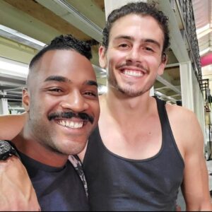 Tommy Martinez Instagram - What hurts the most is that I don’t have many photos of you and I to look back on since I deleted my Facebook. This is the last photo, and the last time I saw you man....just a couple fucking months ago. Your first time in LA, and I was ecstatic to see you and show you around. You seemed so good and happy. You were sober and really focusing on your body. Look at us...Two stooges cheesing at the camera. Your chipped tooth and my broken nose when we ran full speed at each other playing beach football almost 10 years ago. I grew up with you. You were like an older brother to me. Always doing annoying older brother shit until I grew taller and you couldn’t mess with me the way you used to. You were my best bud. I miss going to concerts with you and jumping in the mosh pits. I miss you and Amber crashing at our Freshman place for a month, even though it was only supposed to be 2 weeks. I miss you saying, “Well I cooked, so you have to clean up, TomAss”......I miss you. Too many memories that are flushing through my mind right now. I hate that you were silently going through some shit. I hate that you fucking did this.  PLEASE!!!! If any of you are going through mental/emotional turmoil. TALK TO SOMEBODY.  There’s family, there are friends, there’s a 24 Hour hotline you can call 1-800-273-8255. I can’t take this pain, and I don’t want anybody, on either end, to go through this. Rest easy, Michael George Mcbean.  I love you.