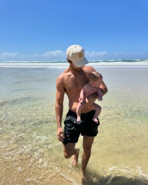 Travis Burns Instagram - Beach days with the little man.