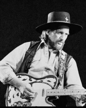 Travis Tritt Instagram - As crazy as it might sound, there are times when I feel like I’m channeling my old friend @officialwaylon when I’m onstage doing one of his songs. Last night was one of those times as captured in this photo. I loved Waylon so much and I know that he loved me. Miss you, Hoss!