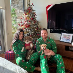 Tyler Grey Instagram - Happy holidays to you and your family from ours! Full disclosure: we borrowed a 2nd dog for animal symmetry.. Going to the movies Christmas Day has been a tradition for me and this year we went to "Godzilla Minus One" (Last year was Avatar). If you are a Veteran, still in the Military, LEO/First Responder: GO SEE THIS MOVIE IMMEDIATELY!! It has some truly great moments about what it means to serve and the struggle we all face with ourselves. Yes I know it's a Godzilla film, but these filmmakers did the opposite of Hollywood and actually set the CGI monster destruction part as a backdrop focusing on a redemption story with some STRONG characters. After 5 minutes you will completely forget it's in subtitles. Just trust me on this it is GREAT. Also of note it takes place at the very end of WWII so make no mistake it really is a war movie with a monster mixed in. Oh and lastly the PJs were my idea, I love corny couples stuff! @cristiane_ferreira_fit @fitqueensantos
